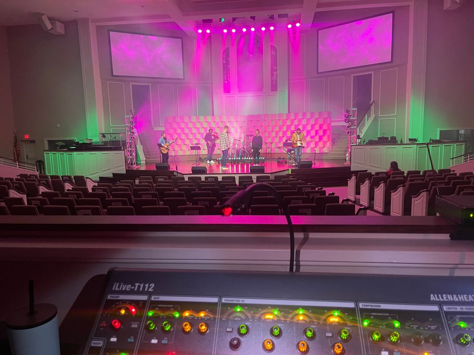 Stage in pink and magenta during a youth service