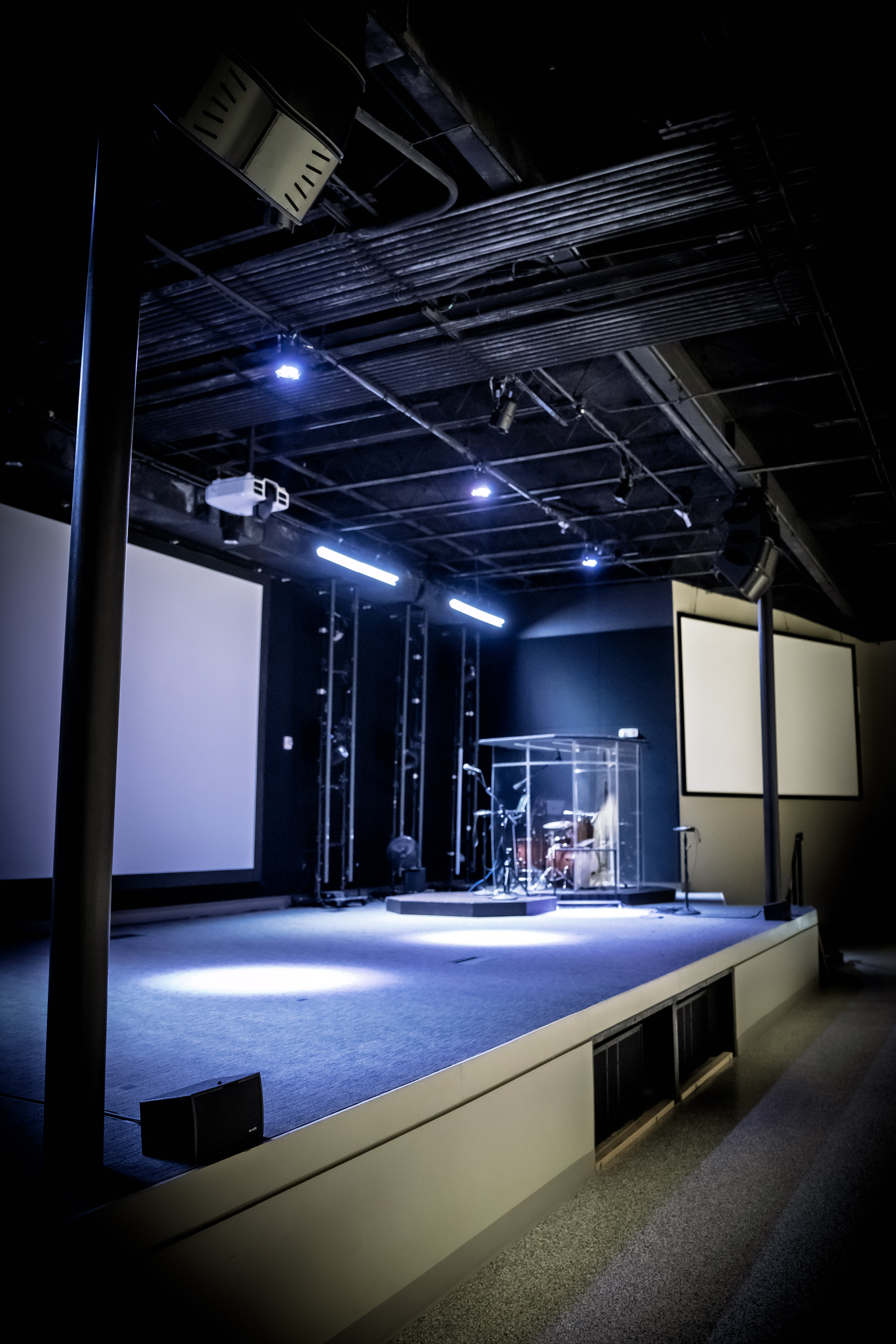 Vertical view of the Blaze Audio CCA10 main hang at Healing Place Church Denham Springs, cabinets stacked above the platform.
